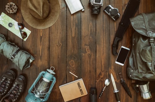 camping gear spread across the floor