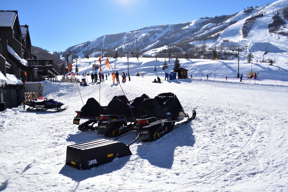 snowmobiles on ski mountain