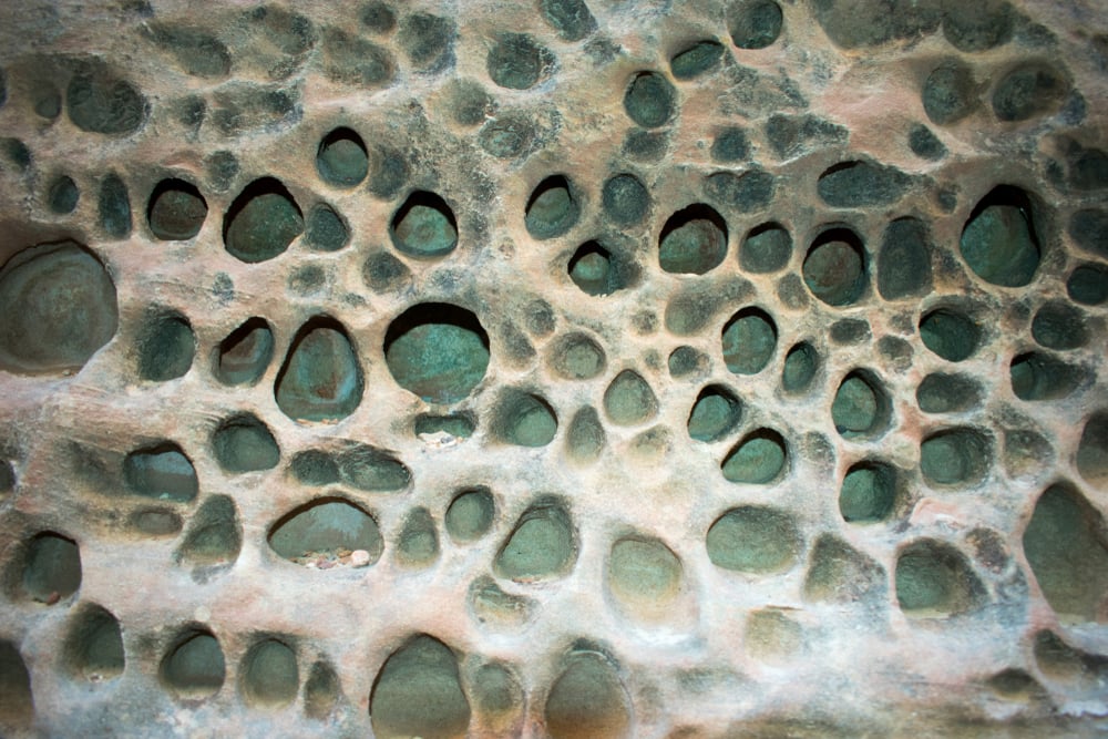 holes in the desert rock