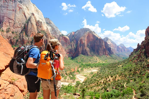 hikers viewing utah landscape