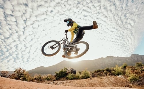 mountain biking trick in air